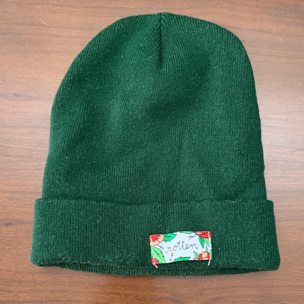 Stay Home Club forest green beanie with “rotten” patch